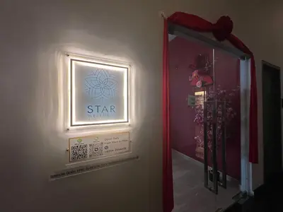 a room with a star sign on a wall at Star Suite 5min Walk to KLCC Netflix in Kuala Lumpur