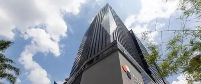 a tall building with the sky in the background at The Luxmi - Bangsar Trade Centre in Kuala Lumpur