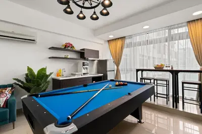a living room with a pool table in it at Fahenheit 88, Kuala Lumpur 17 in Kuala Lumpur
