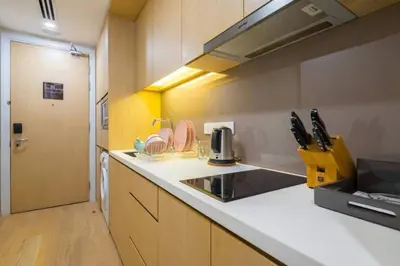 a kitchen with a sink and a counter top at 188 Suites KLCC by Signature Apartment in Kuala Lumpur