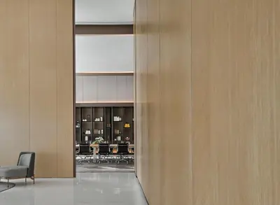 a view through a door into a room with a chair at Amari Kuala Lumpur in Kuala Lumpur