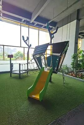 a playground with a slide in a building at Merdeka Tower 118 Chinatown TRX at Opus in Kuala Lumpur