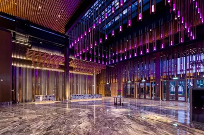 an empty room with chairs and lights in a building at M Resort & Hotel Kuala Lumpur in Kuala Lumpur