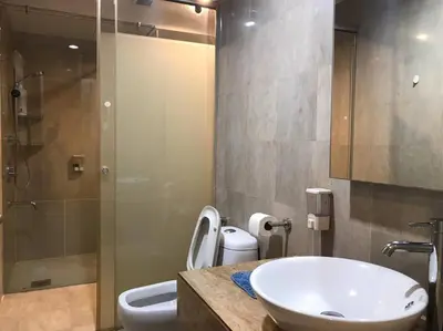 a bathroom with a sink and a toilet and a shower at Gorgeous Fairlane 2 Bedrooms - Bukit Bintang KL in Kuala Lumpur
