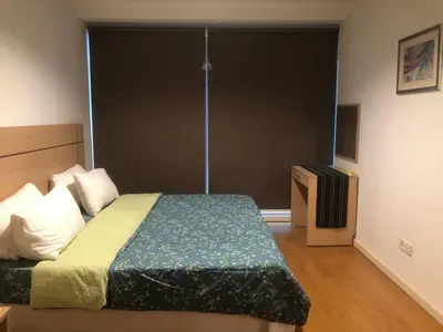 a bedroom with a bed and a large window at Gorgeous Fairlane 2 Bedrooms - Bukit Bintang KL in Kuala Lumpur