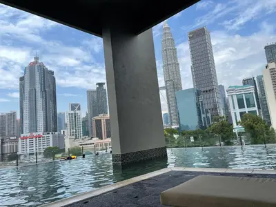 a view of a city from a building with water at Legasi Kampung Bharu by Tulip in Kuala Lumpur