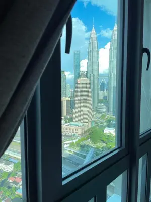 a view from a window of a city skyline at Legasi Kampung Bharu by Tulip in Kuala Lumpur
