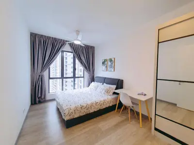 a bedroom with a bed and a desk and a window at United Point Residence 6 pax Near Mont Kiara Desa Park Kepong in Kuala Lumpur