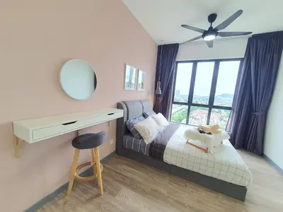 a bedroom with a bed and a desk with a mirror at United Point Residence 6 pax Near Mont Kiara Desa Park Kepong in Kuala Lumpur