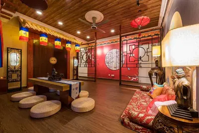 a room with a table and stools in a room at Fahrenheit88-Korea Theme Bukit Bintang Kuala Lumpur 2R2B 6Pax in Kuala Lumpur