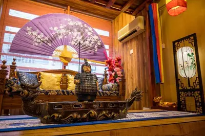 a room with a bed with a statue on a table at Fahrenheit88-Korea Theme Bukit Bintang Kuala Lumpur 2R2B 6Pax in Kuala Lumpur