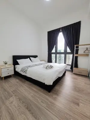 a bedroom with a bed and a large window at Bangsar South Apartment by Sarah's Lodge @ SouthLink Lifestyle Apartment in Kuala Lumpur