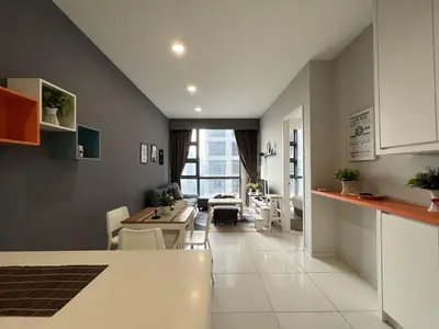a kitchen and dining room with a table and chairs at Eclipse Suites Robertson Bukit Bintang in Kuala Lumpur