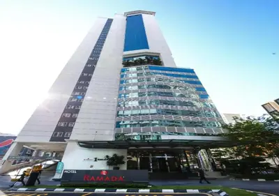 a tall building with a lot of windows at 2BR Tourists-Friendly Oasis - Heart of the City KL by Verano in Kuala Lumpur