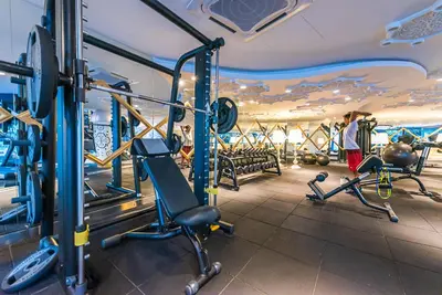 a gym with cardio equipment in a room at Urban Duplex v Balcony- 2R2B Up to 7Pax, MontKiara by Verano in Kuala Lumpur