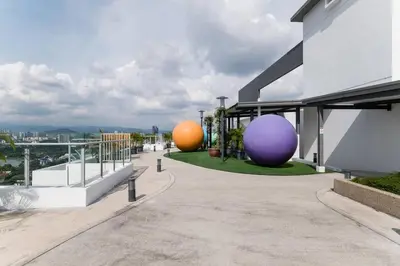 three large spheres sitting on the side of a building at TR Residence Lovely 3 BR unit 6pax next to Titiwangsa LRT in Kuala Lumpur