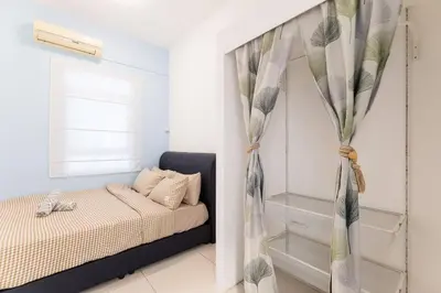 a bedroom with a bed and a window at TR Residence Lovely 3 BR unit 6pax next to Titiwangsa LRT in Kuala Lumpur