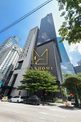a sign on the side of a building at Maxhome Plus at Dorsett Bukit Bintang in Kuala Lumpur