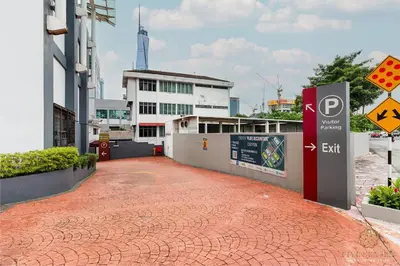 a red brick walkway in front of a building at Dua Sentral Kuala Lumpur, Roam in Kuala Lumpur