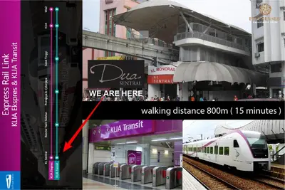 a train station with a train on the tracks at Dua Sentral Kuala Lumpur, Roam in Kuala Lumpur