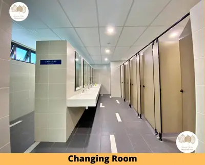 a bathroom with sinks and mirrors and a changing room at Pacific Home Petaling Jaya by Seven Sins in Petaling Jaya