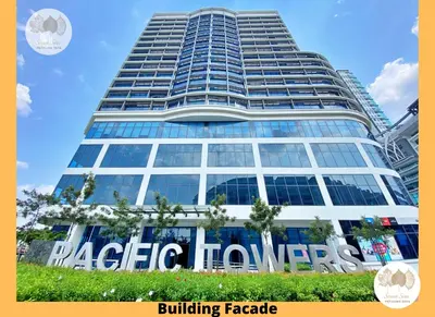 a large building with a sign in front of it at Pacific Home Petaling Jaya by Seven Sins in Petaling Jaya