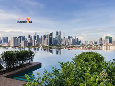 a view of the singapore city skyline from the water at Datum Jelatek Sky Residence KLCC, Five Senses in Kuala Lumpur