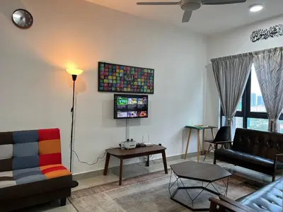 a living room with a couch and a table at Dsistyle Islamic House in Kuala Lumpur