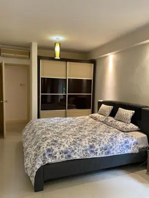 a bedroom with a large bed and a large window at KLCC Studio One Bedroom in Kuala Lumpur