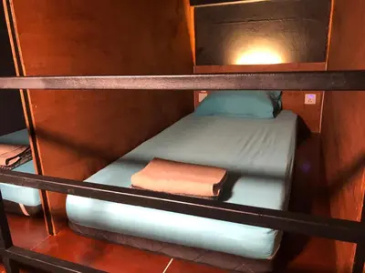 a couple of bunk beds in a room at OA ThE FACTORY AT BUKIT BINTANG in Kuala Lumpur