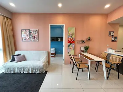 a living room with a bed and a table and chairs at The Robertson 2B at Bukit Bintang with Netflix,trx,klcc,pavilion,lalaport in Kuala Lumpur