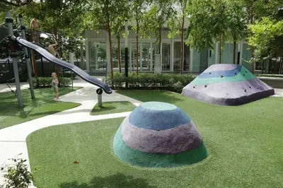 a playground with a slide in a park at MyCrib45*The Robertson KL-B.Bintang in Kuala Lumpur