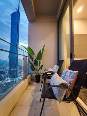 an apartment balcony with a view of a city at MyCrib45*The Robertson KL-B.Bintang in Kuala Lumpur