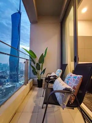 a balcony with a view of a city at MyCrib45*The Robertson KL-B.Bintang in Kuala Lumpur