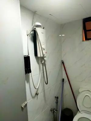 a shower in a bathroom with a toilet at Omar's place 4 - Best view of KLCC Twin Towers. in Kuala Lumpur