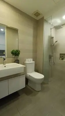 a bathroom with a toilet and a sink and a shower at A05 Bukit Ceylon KL Tower View Balcony Apartment in Kuala Lumpur
