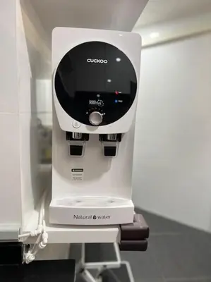 a white hair dryer sitting on a shelf at Charming apartment with Netflix at PWTC in Kuala Lumpur