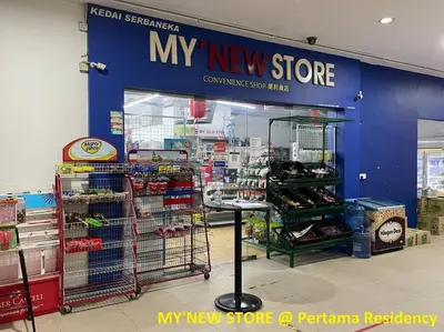 a new store with a blue wall in a store at Staycation with Private Jacuzzi @ KL Downtown 1711 in Kuala Lumpur