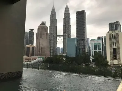 a view of a city skyline with tall buildings at KLCC VIEW-3 BED LOVELY APARTMENTS IN KUALA LUMPUR in Kuala Lumpur