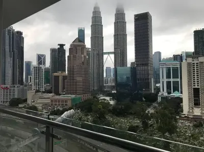 a view of a city skyline with tall buildings at KLCC VIEW-3 BED LOVELY APARTMENTS IN KUALA LUMPUR in Kuala Lumpur