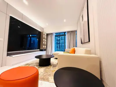 a living room with a large flat screen tv at Eaton residences KLCC m@h in Kuala Lumpur