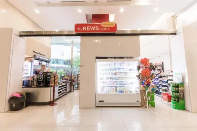 a store aisle with a door in a grocery store at Bukit Bintang KLCC Binjai 8 Premium Soho Apartment by Sarah's Lodge in Kuala Lumpur