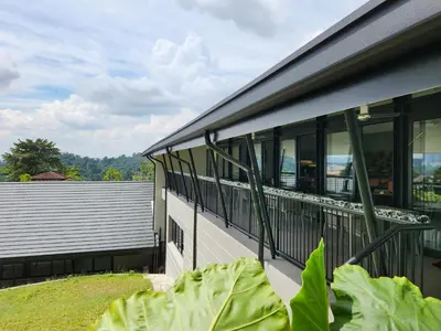 a house with windows on the side of it at Domitys Bangsar Kuala Lumpur in Kuala Lumpur