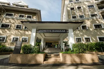 a building with a sign that reads dominos bangatown at Domitys Bangsar Kuala Lumpur in Kuala Lumpur