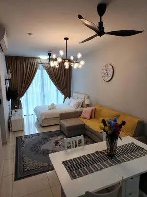 a living room with a couch and a bed at Datum Jelatek linked LRT and MALL with Netflix -Disney -WashDryer in Kuala Lumpur