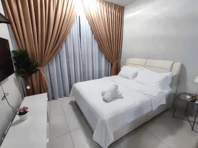 a bedroom with a white bed and a large window at Datum Jelatek linked LRT and MALL with Netflix -Disney -WashDryer in Kuala Lumpur
