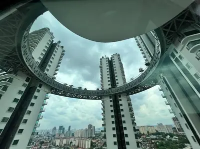 a circular view of a city from a building at Datum Jelatek linked LRT and MALL with Netflix -Disney -WashDryer in Kuala Lumpur