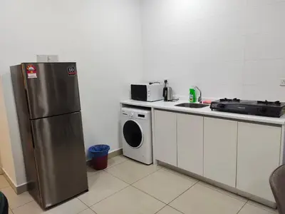 a kitchen with a stainless steel refrigerator and a dishwasher at Arte plus by Nicestay in Kuala Lumpur