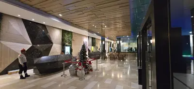 a lobby with a christmas tree in the middle of a building at M-City Ampang in Kuala Lumpur