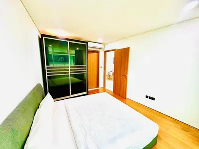 a room with a bed and a large window at VortexLuxApartman KLCC, kuala lampur city in Kuala Lumpur